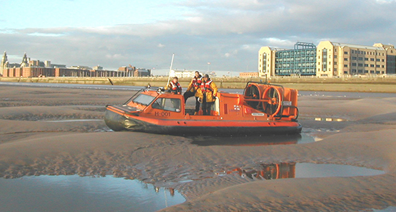 RNLI 470TD Search And Rescue Hovercraft Over Mud RNLI 470TD Search And Rescue Hovercraft Over Mud